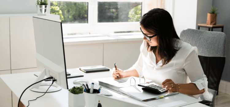 person typing on computer